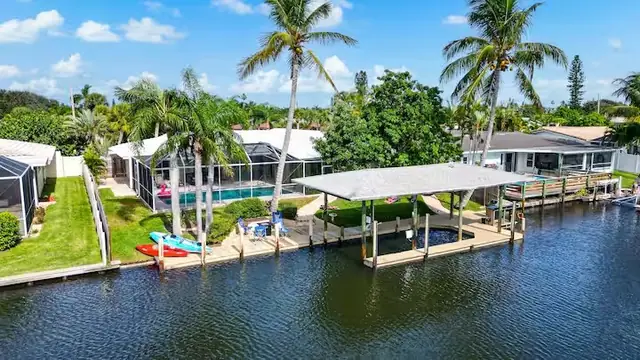 Canal-front short-term rental with pool and boat dock in Cocoa Beach, Florida, owned by Brian Bowman